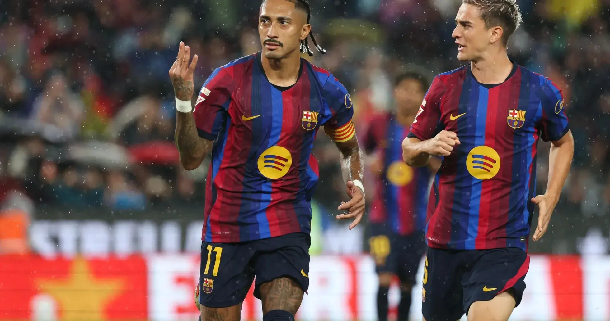 Barcelona players celebrating a goal in La Liga Barcelona players celebrating a goal in La Liga
