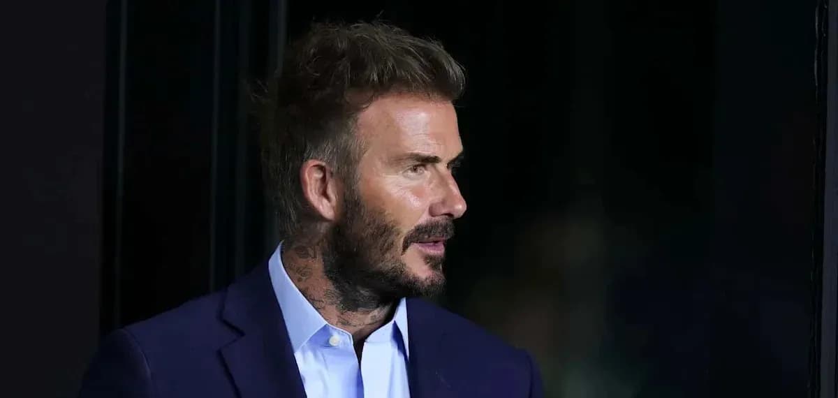Man with tattoos and styled hair in suit Man with tattoos and styled hair in suit