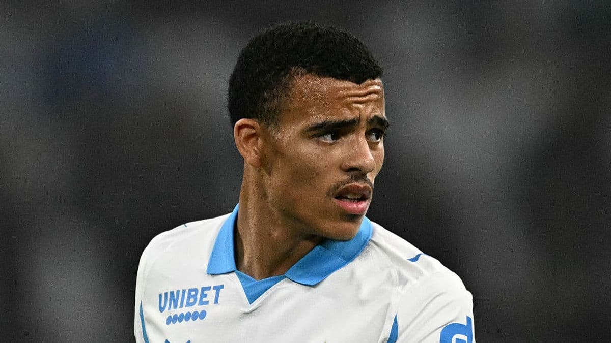 Player in white jersey looking during match Player in white jersey looking during match