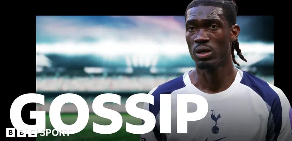 Football player wearing Tottenham jersey on field Football player wearing Tottenham jersey on field