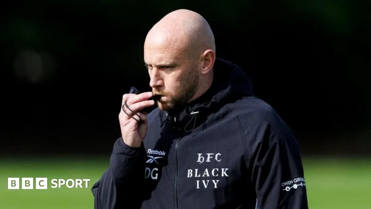 Coach blowing whistle during training session outdoors Coach blowing whistle during training session outdoors