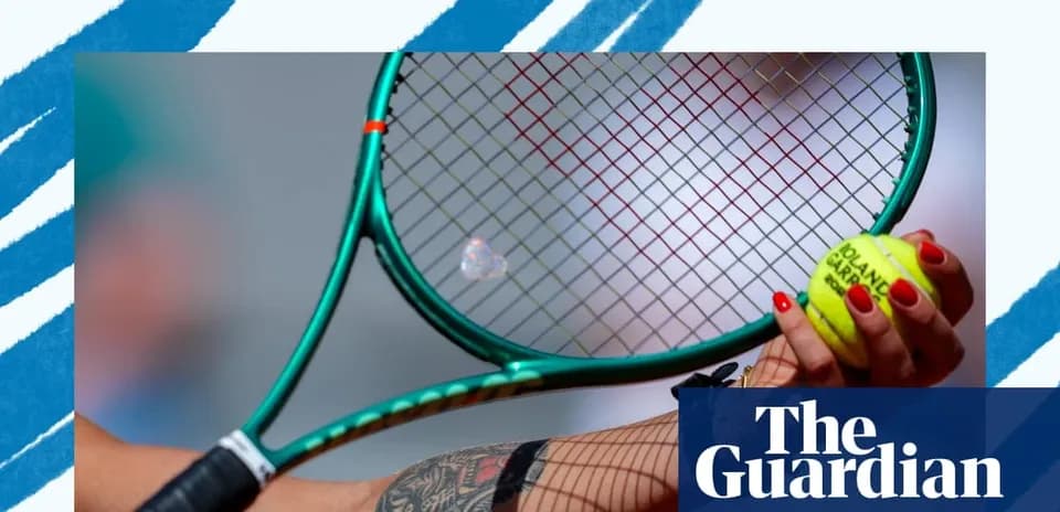 Close-up of a hand holding a tennis racket and ball Close-up of a hand holding a tennis racket and ball