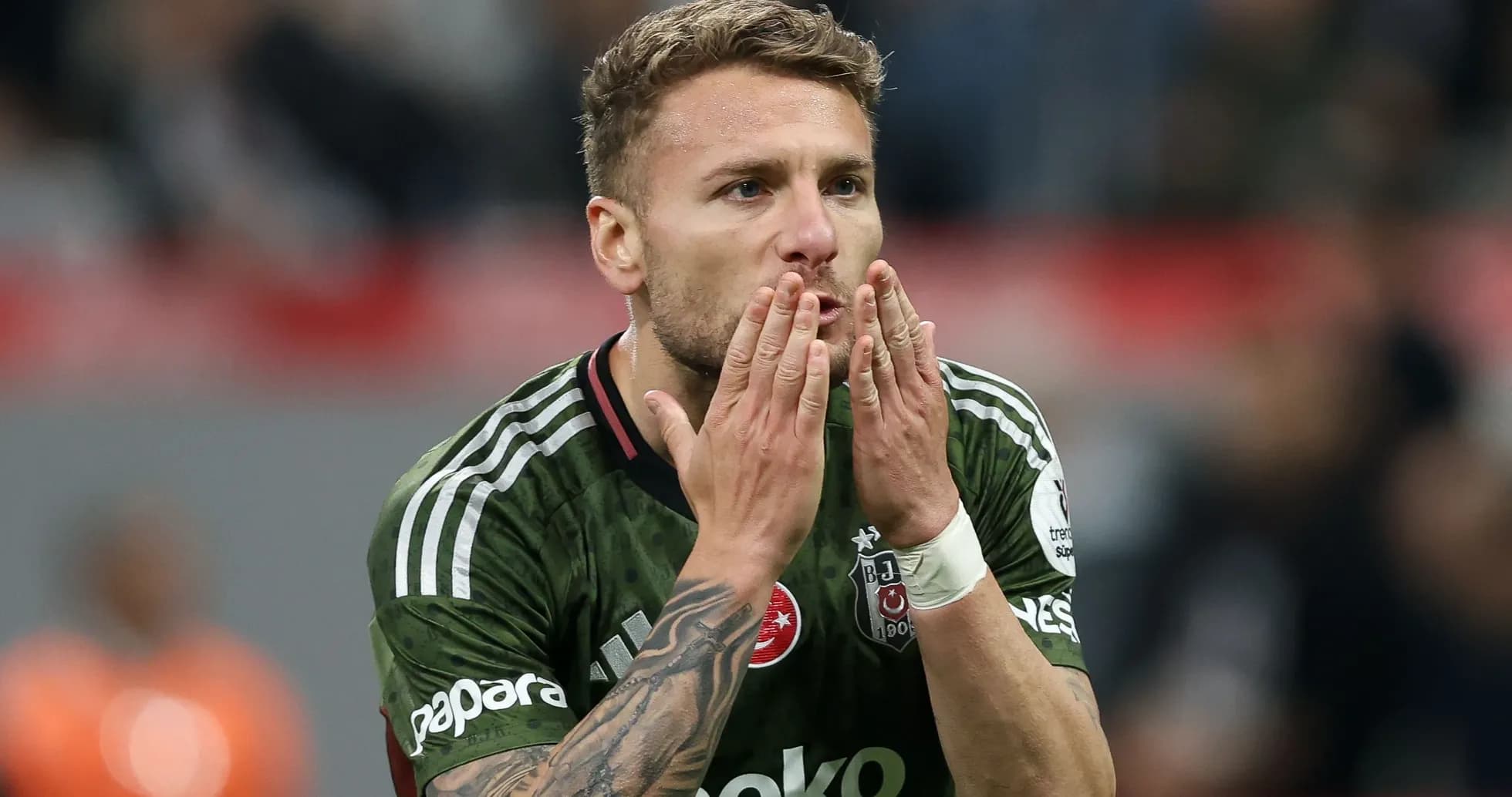 Player blowing kisses during a match celebration Player blowing kisses during a match celebration