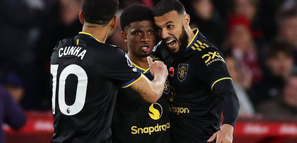 Manchester United players celebrating a goal Manchester United players celebrating a goal