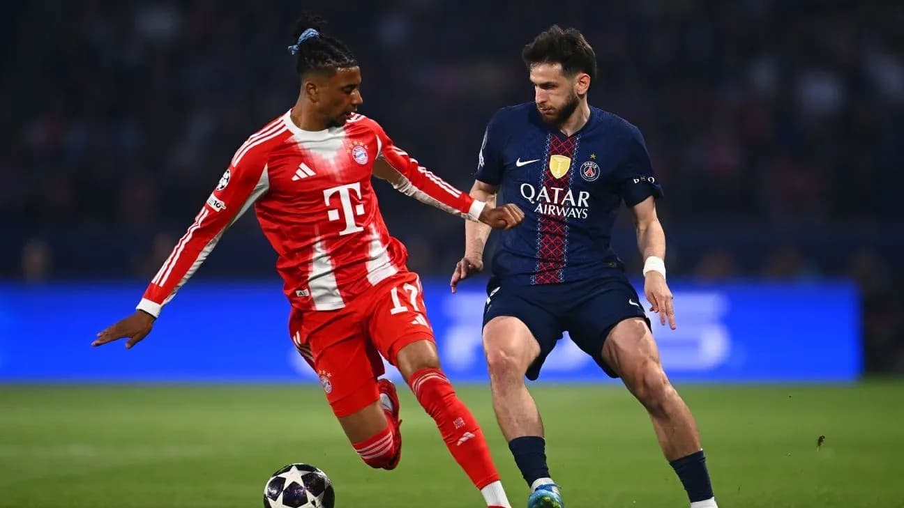 Bayern and PSG players competing for the ball Bayern and PSG players competing for the ball