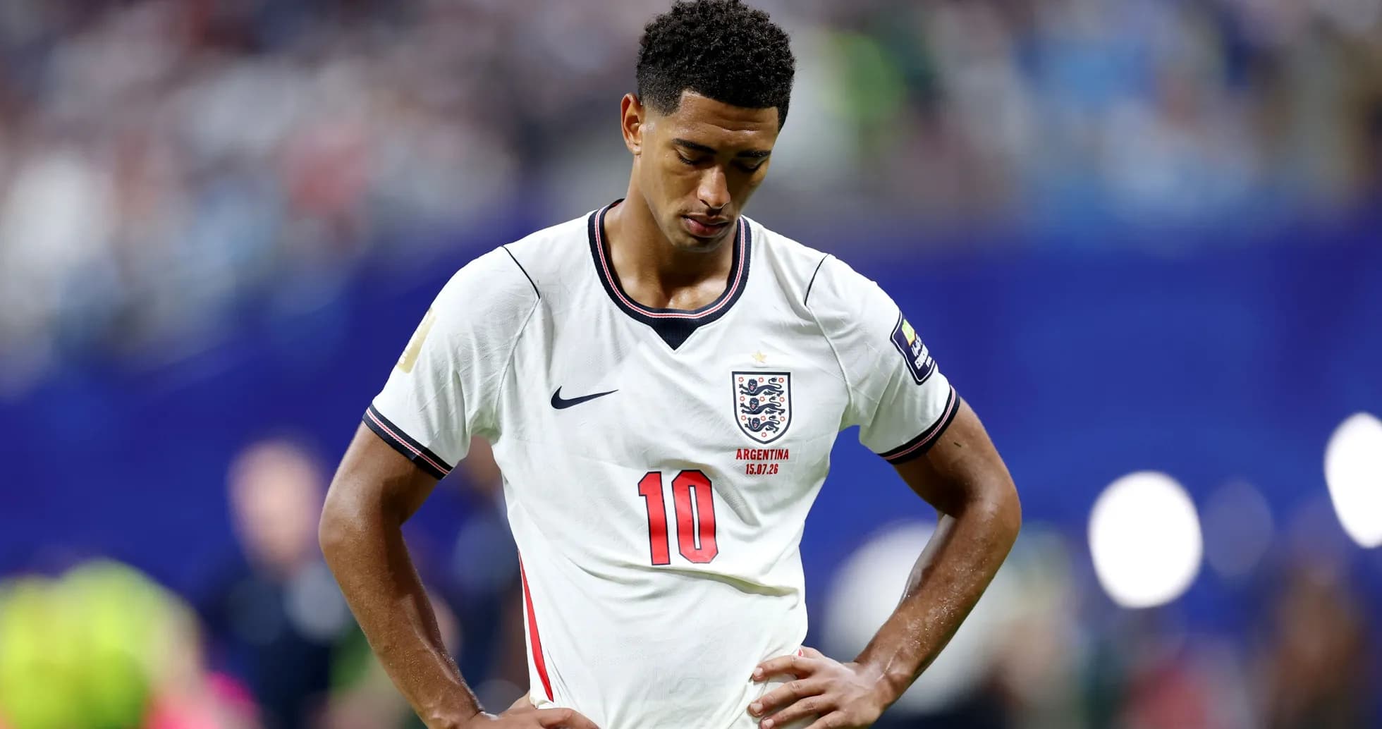 Player looking down wearing England jersey during match Player looking down wearing England jersey during match