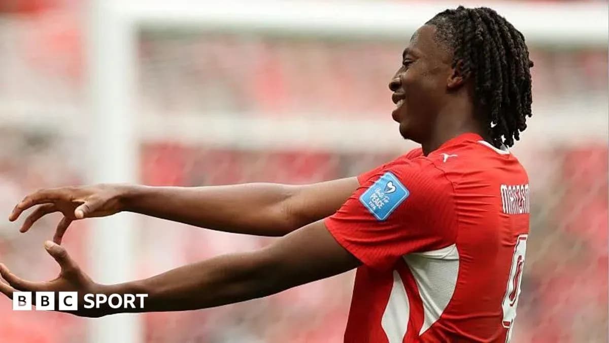 Player celebrating a goal during a match Player celebrating a goal during a match