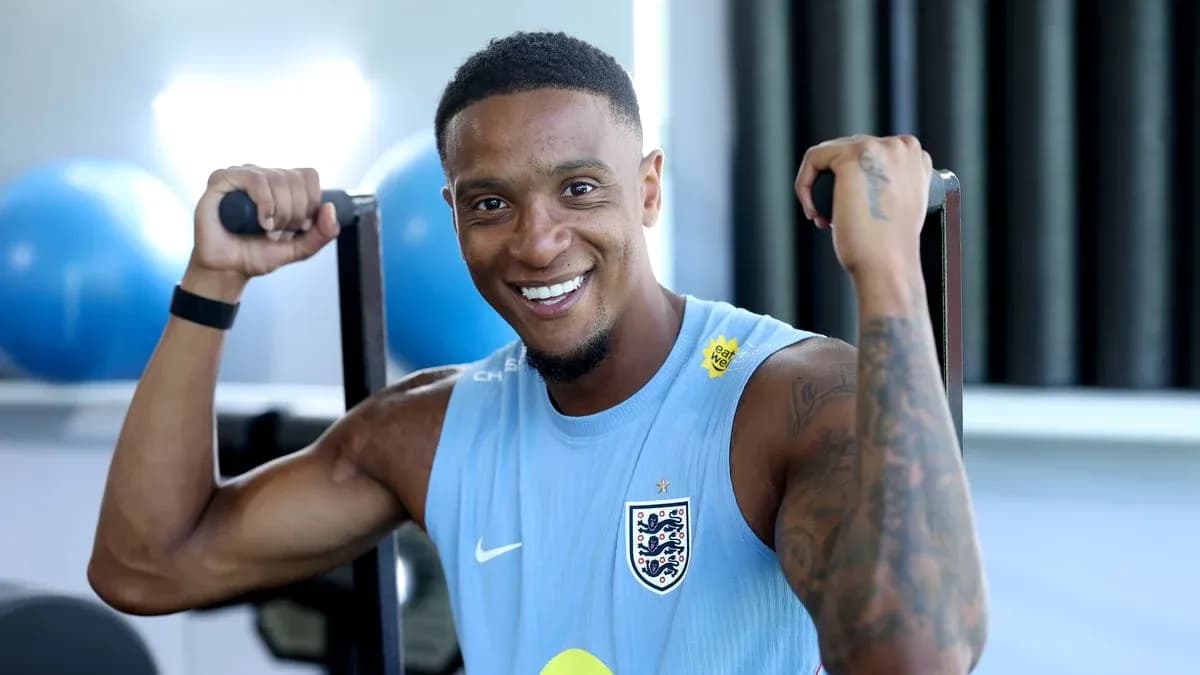 Player exercising with weights in training session Player exercising with weights in training session