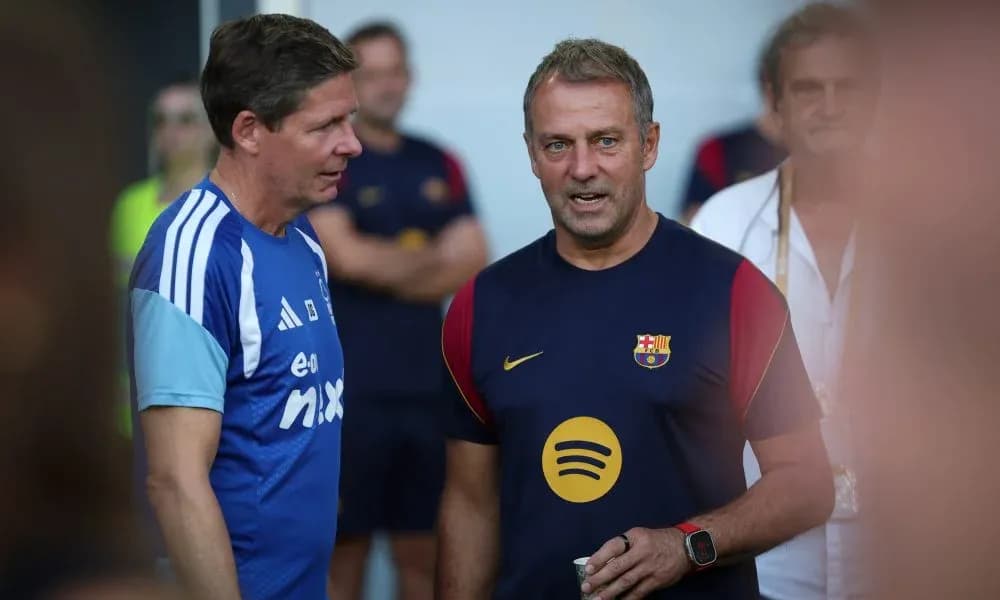 Coaches discussing during Barcelona training session Coaches discussing during Barcelona training session
