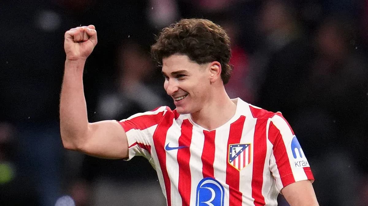 Player celebrating after scoring a goal for Atlético Madrid Player celebrating after scoring a goal for Atlético Madrid