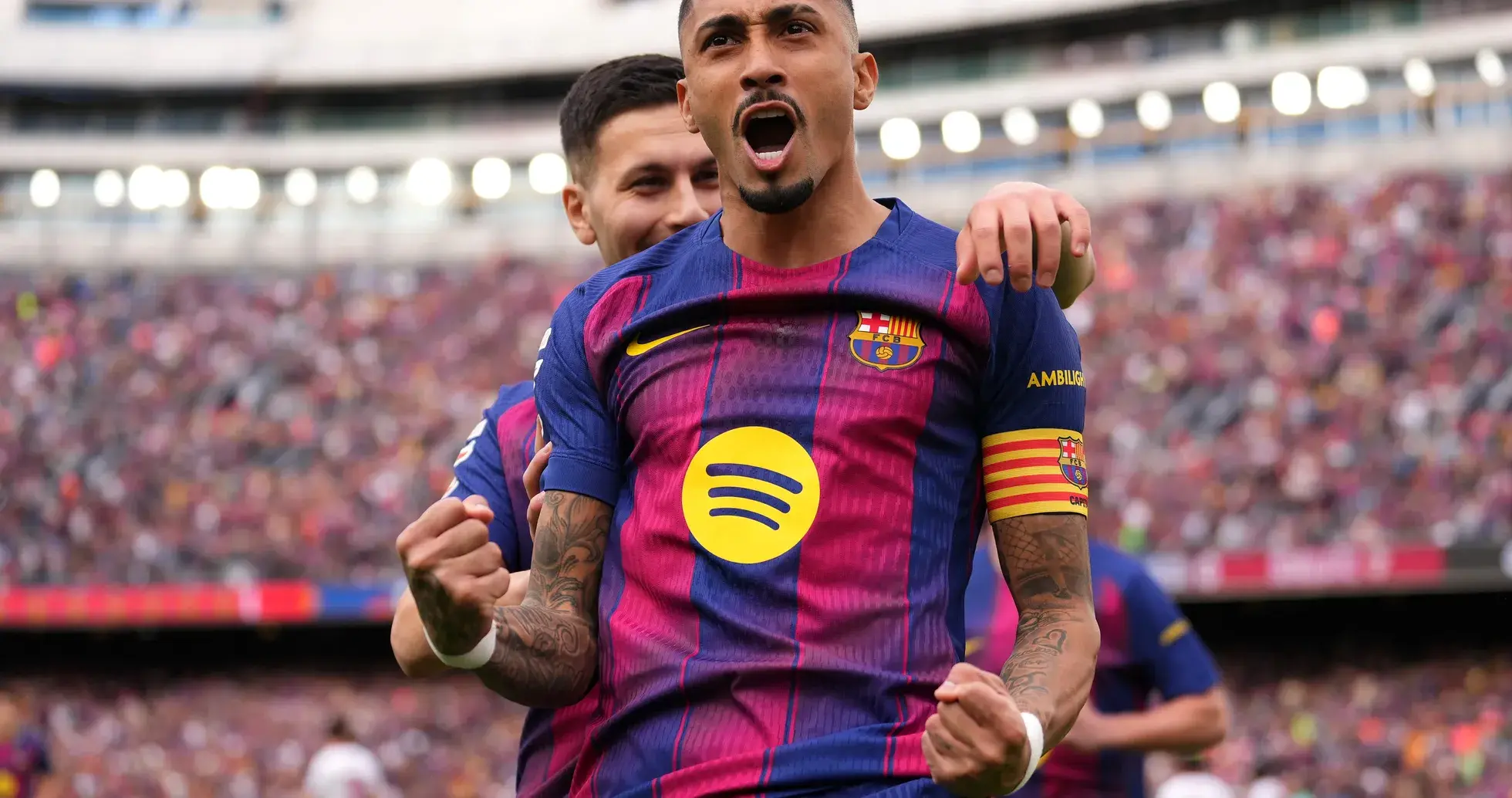 Barcelona player celebrating in front of crowd Barcelona player celebrating in front of crowd