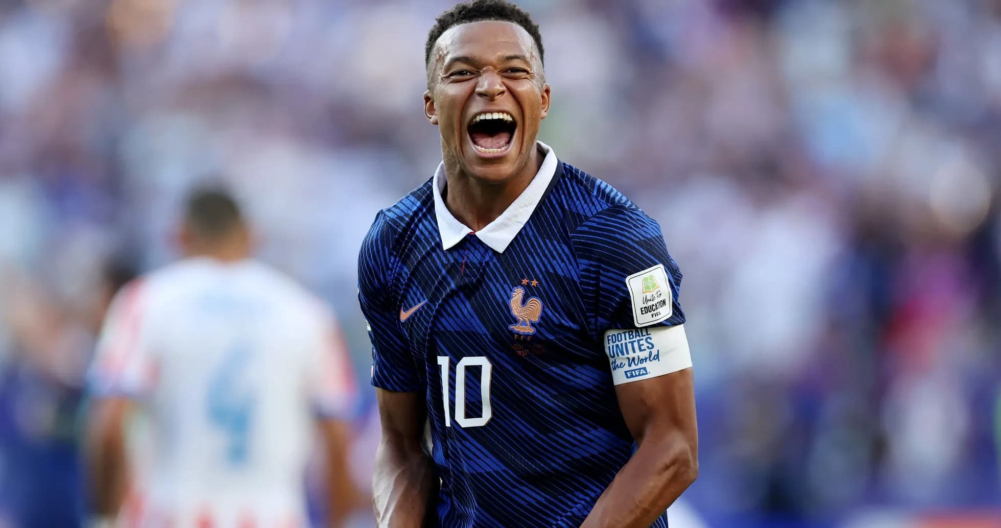 Player celebrating during international football match Player celebrating during international football match