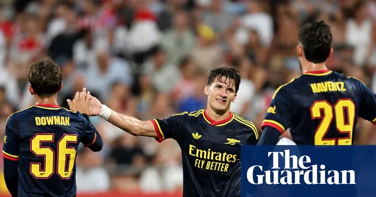 Arsenal players celebrating a goal during match Arsenal players celebrating a goal during match