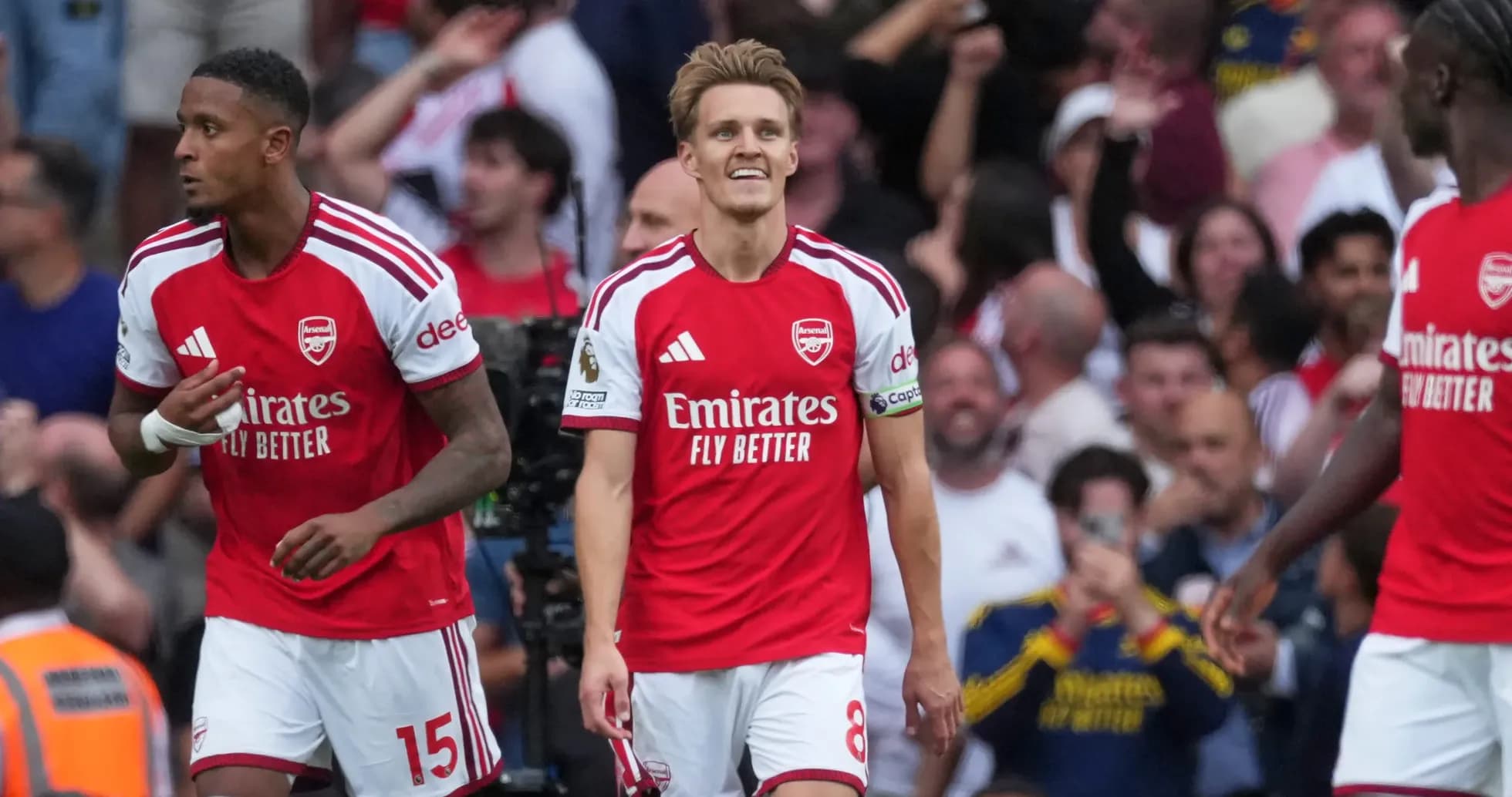 Arsenal players celebrating during match against Chelsea Arsenal players celebrating during match against Chelsea