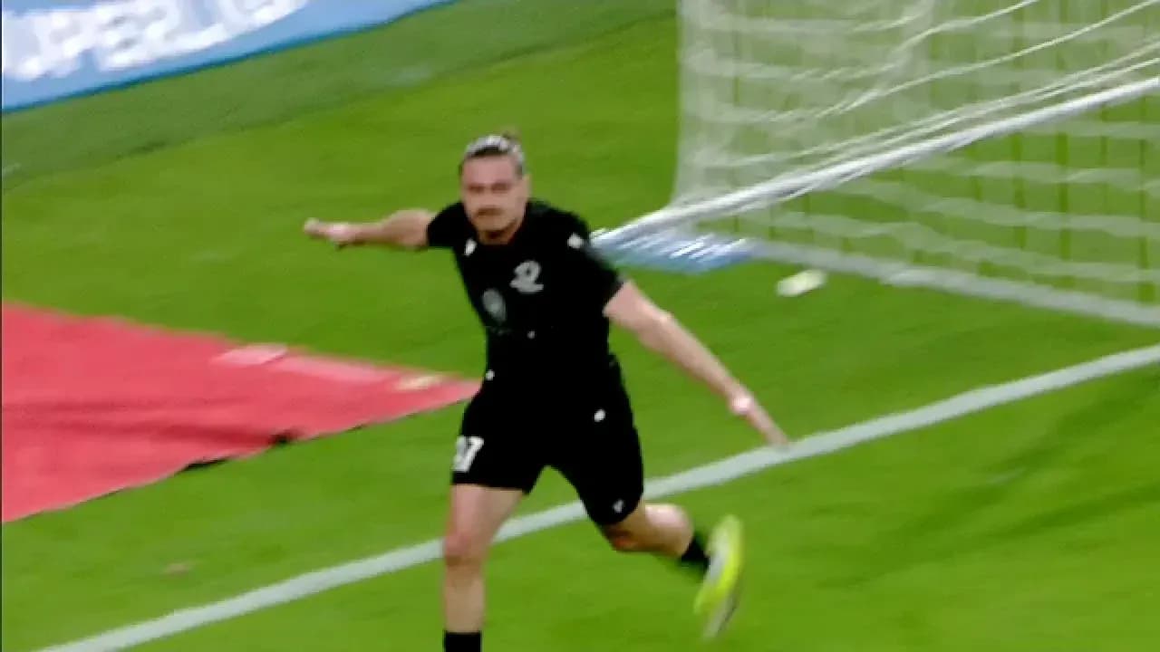 Player celebrating goal during UEFA Europa League match Player celebrating goal during UEFA Europa League match