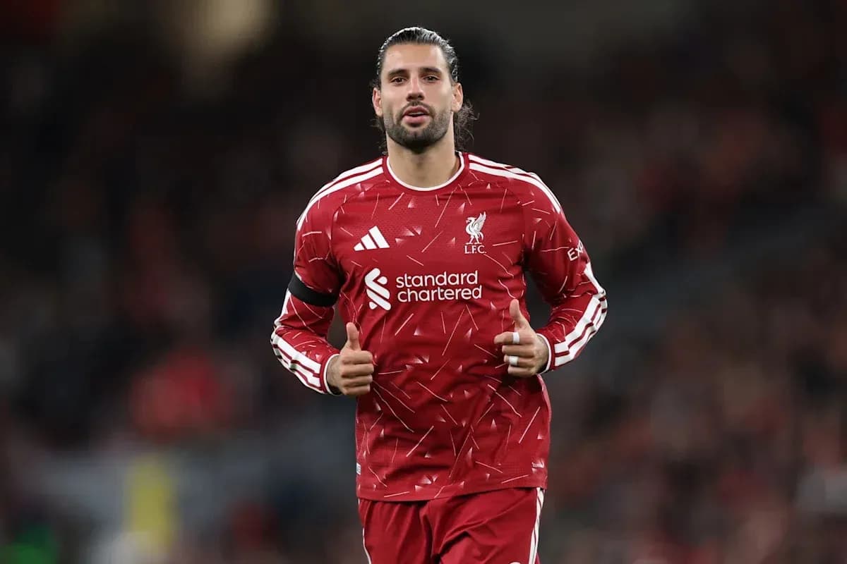 Player in Liverpool kit giving thumbs up Player in Liverpool kit giving thumbs up