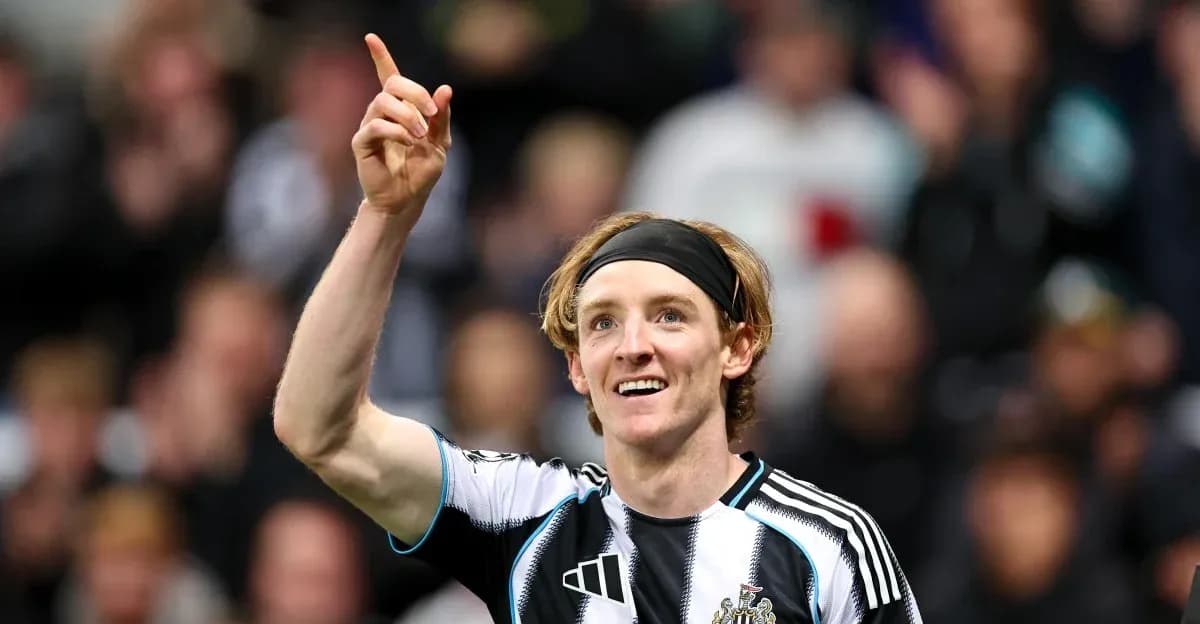 Player celebrating a goal with raised finger Player celebrating a goal with raised finger