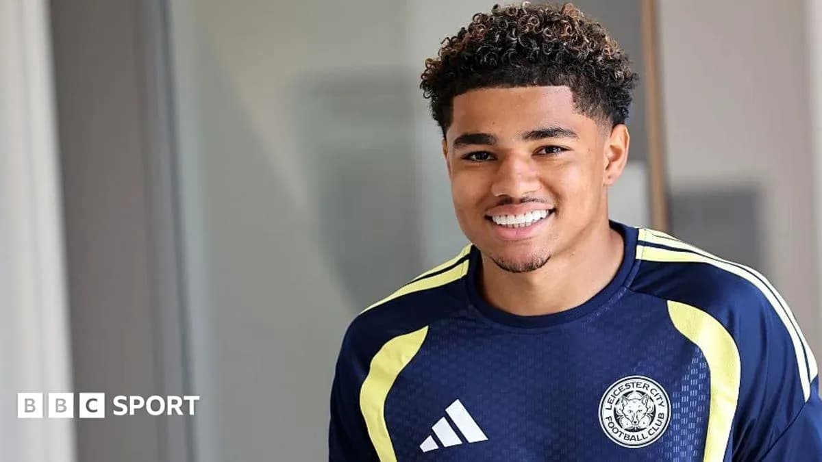 Player smiling in Leicester City training kit Player smiling in Leicester City training kit