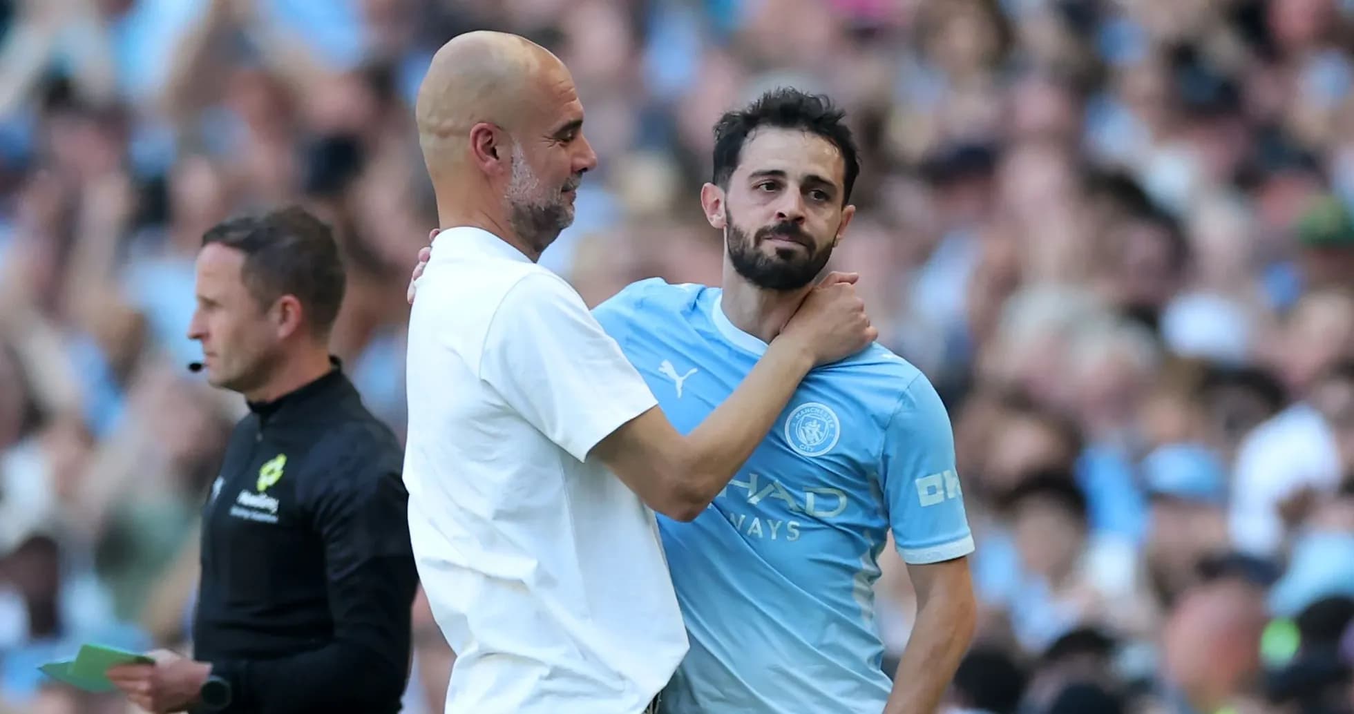 Coach and player interacting during match substitution Coach and player interacting during match substitution