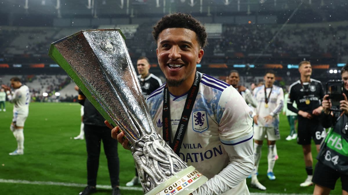 Player celebrating with UEFA Europa League trophy Player celebrating with UEFA Europa League trophy