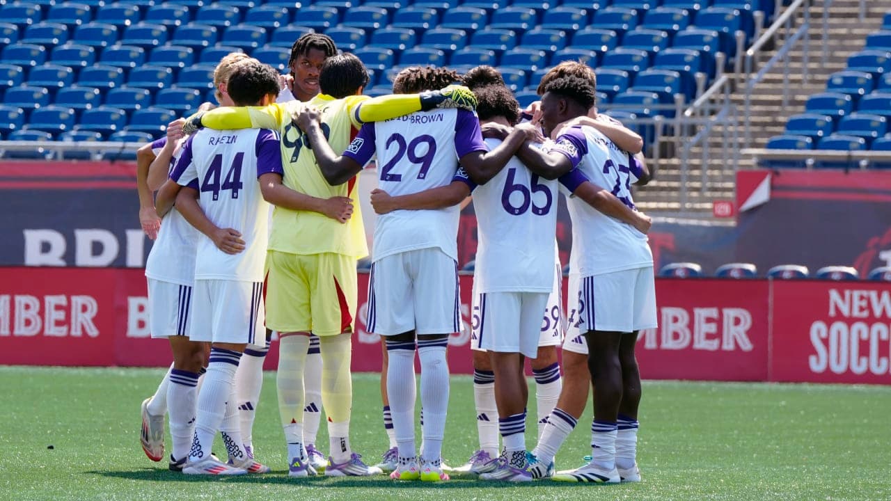 Orlando City II players in a team huddle Orlando City II players in a team huddle