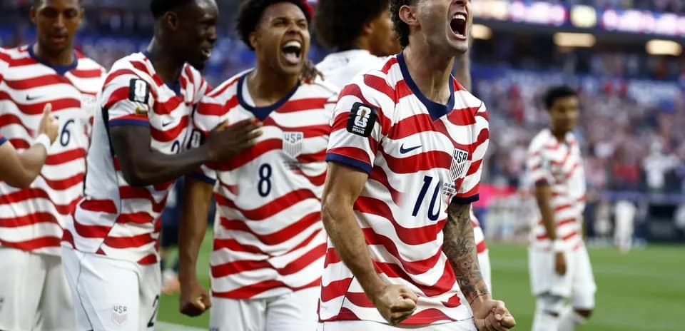 USA players celebrating during World Cup match USA players celebrating during World Cup match