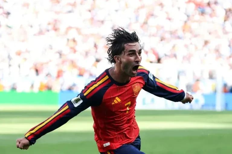Player celebrating a goal in Spain jersey Player celebrating a goal in Spain jersey