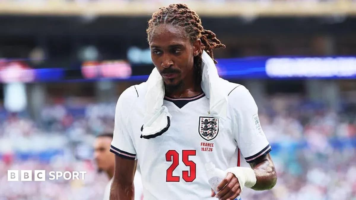 Player wearing England jersey walking off the field Player wearing England jersey walking off the field