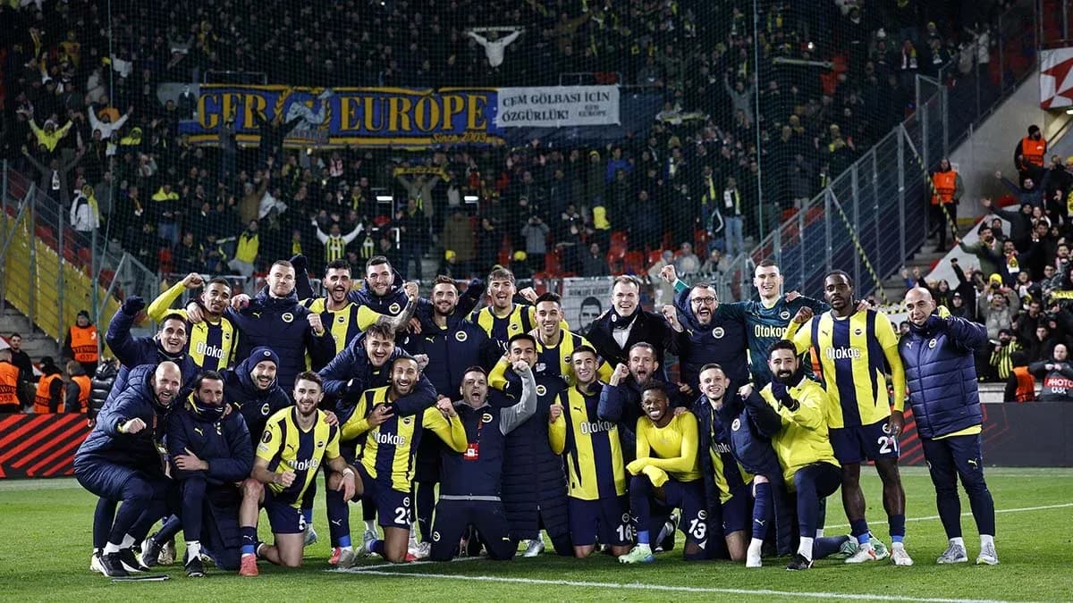Fenerbahçe players celebrating with fans after match Fenerbahçe players celebrating with fans after match
