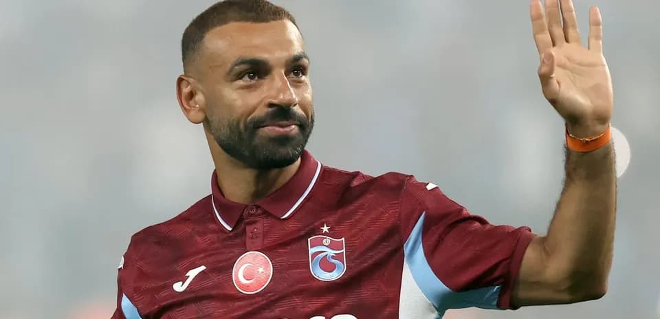 Player waving while wearing Trabzonspor jersey Player waving while wearing Trabzonspor jersey