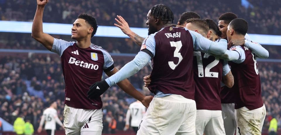 Aston Villa players celebrating a goal Aston Villa players celebrating a goal
