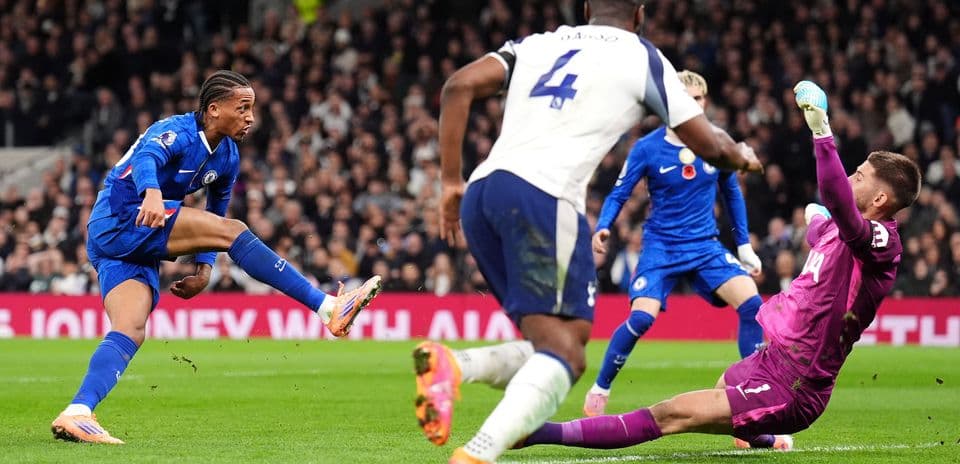 Chelsea player shooting on goal against Tottenham Chelsea player shooting on goal against Tottenham