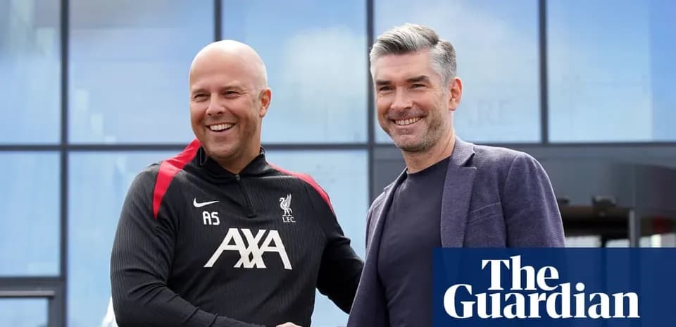 Two men shaking hands outside Liverpool training facility Two men shaking hands outside Liverpool training facility