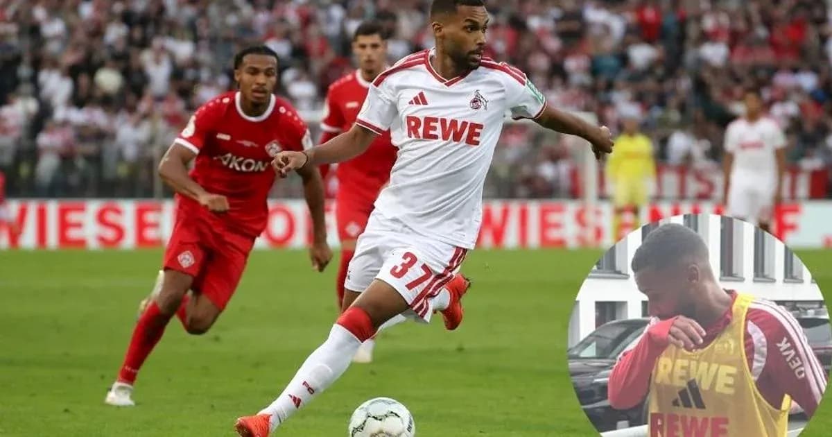 Player dribbling the ball during a match Player dribbling the ball during a match