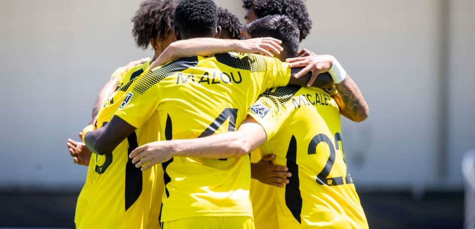 Columbus Crew II players celebrating a goal Columbus Crew II players celebrating a goal