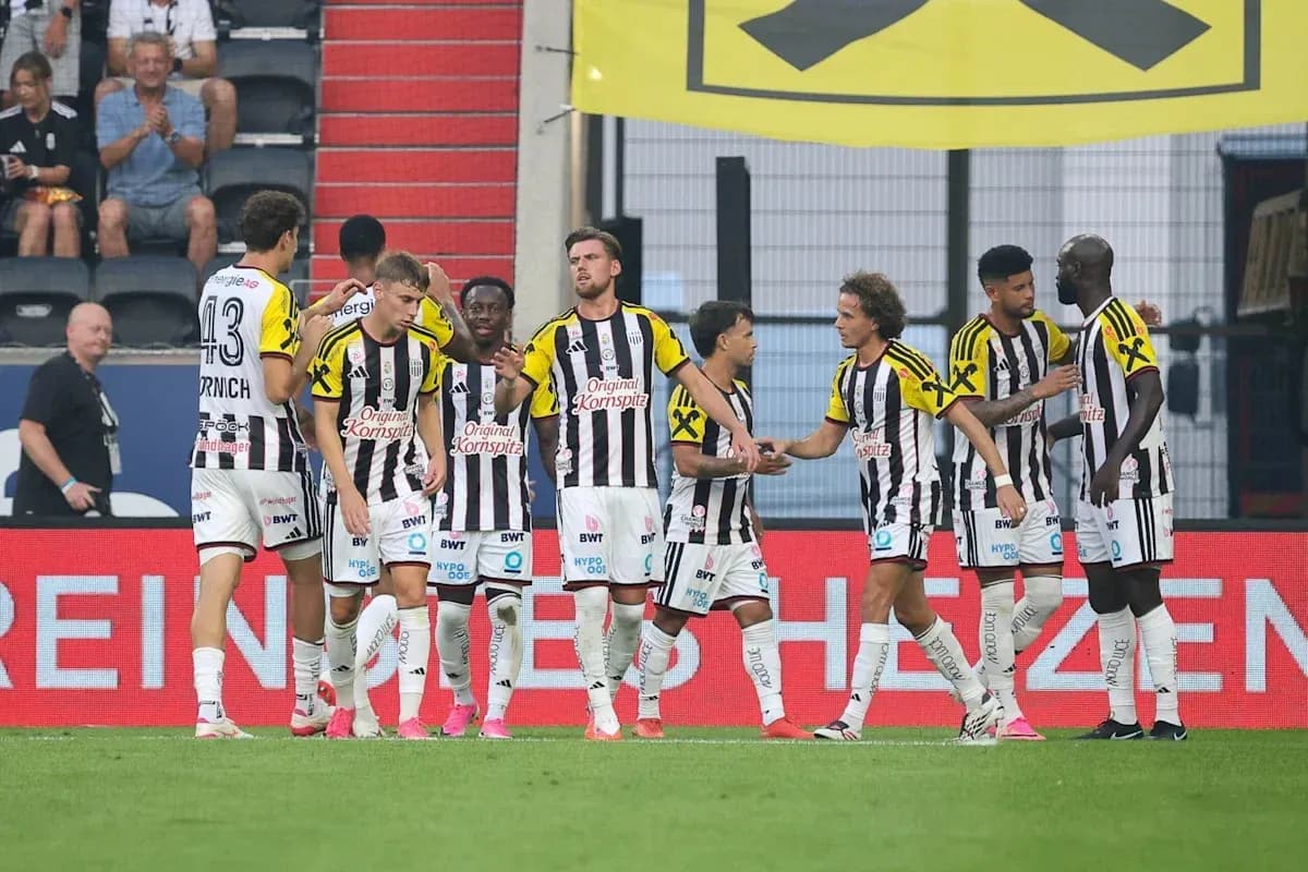 Team celebrating a goal during a match Team celebrating a goal during a match