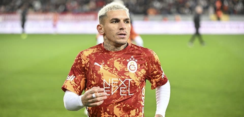 Player in Galatasaray jersey on the field Player in Galatasaray jersey on the field