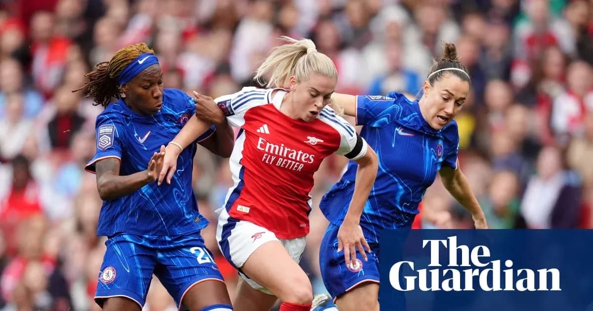 Two Chelsea players challenging Arsenal player for ball Two Chelsea players challenging Arsenal player for ball