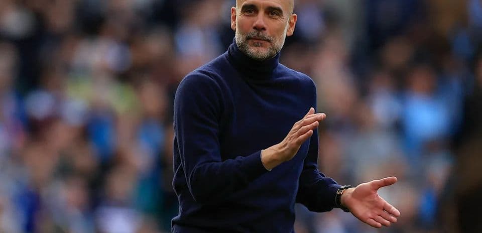 Manager gesturing during a football match Manager gesturing during a football match