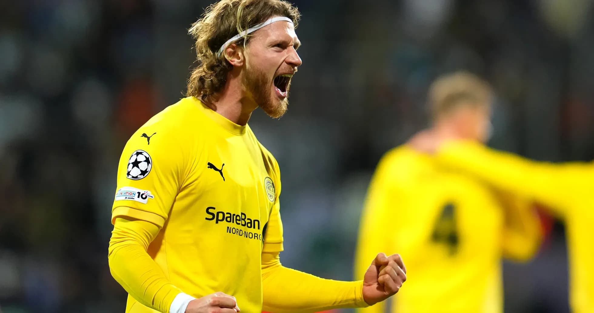 Goalkeeper celebrating during UEFA Champions League match Goalkeeper celebrating during UEFA Champions League match