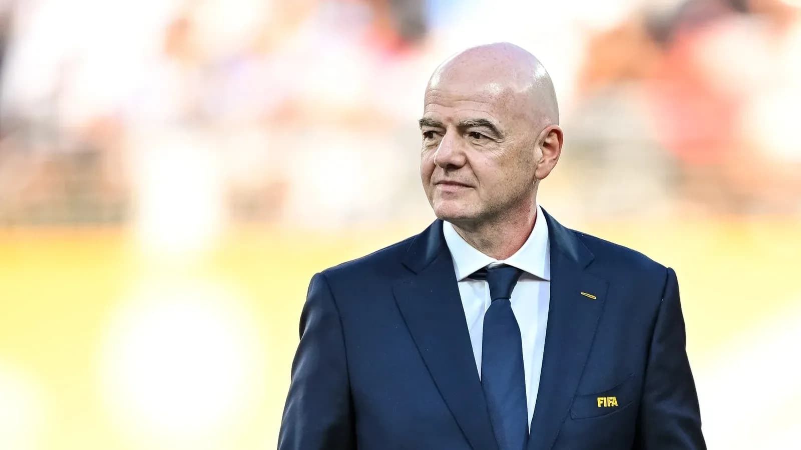 FIFA president walking on the pitch during event FIFA president walking on the pitch during event