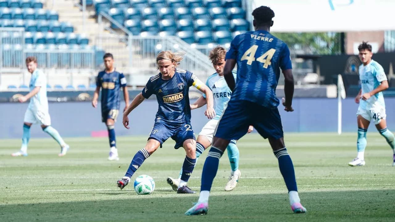 Chattanooga player dribbling past Philadelphia Union II Chattanooga player dribbling past Philadelphia Union II