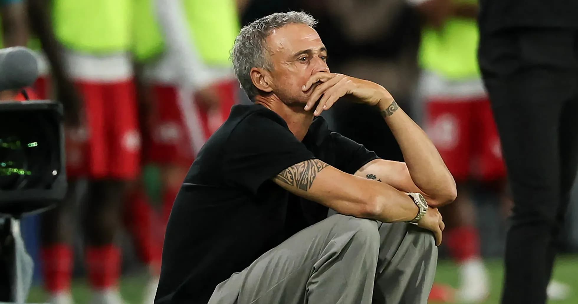 Coach sitting on the sideline during match Coach sitting on the sideline during match