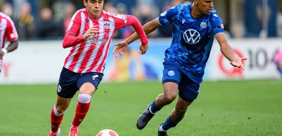 Player dribbling the ball during match Player dribbling the ball during match