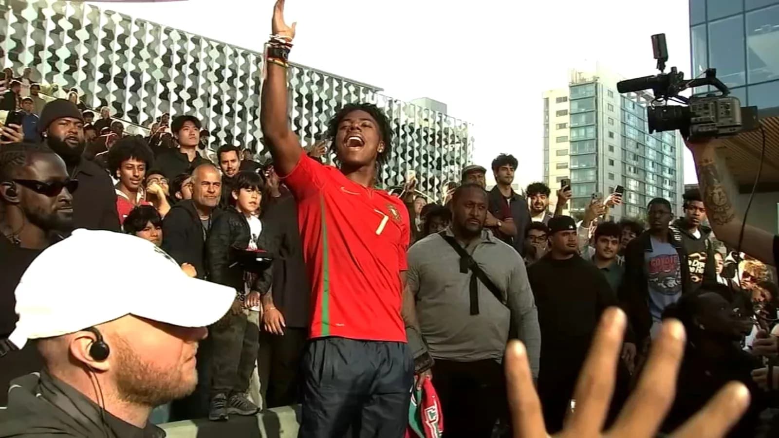 Fan celebrating in Portugal jersey during gathering Fan celebrating in Portugal jersey during gathering