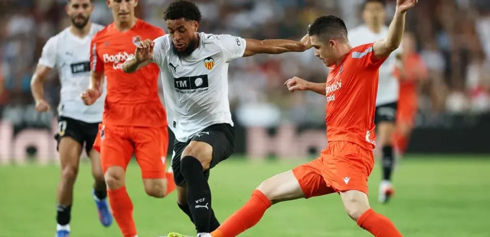 Players competing during Real Sociedad vs Valencia match Players competing during Real Sociedad vs Valencia match