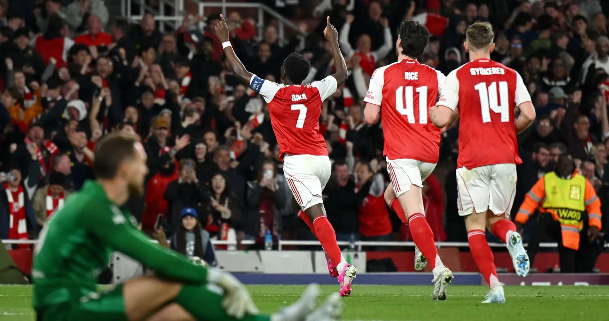 Arsenal players celebrating a goal during match Arsenal players celebrating a goal during match