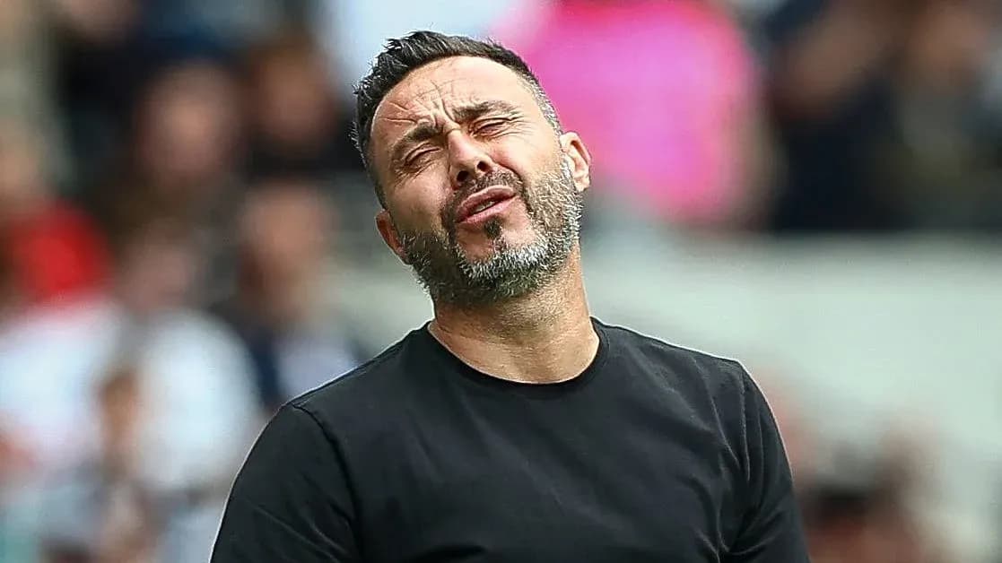 Manager expressing frustration during a match Manager expressing frustration during a match