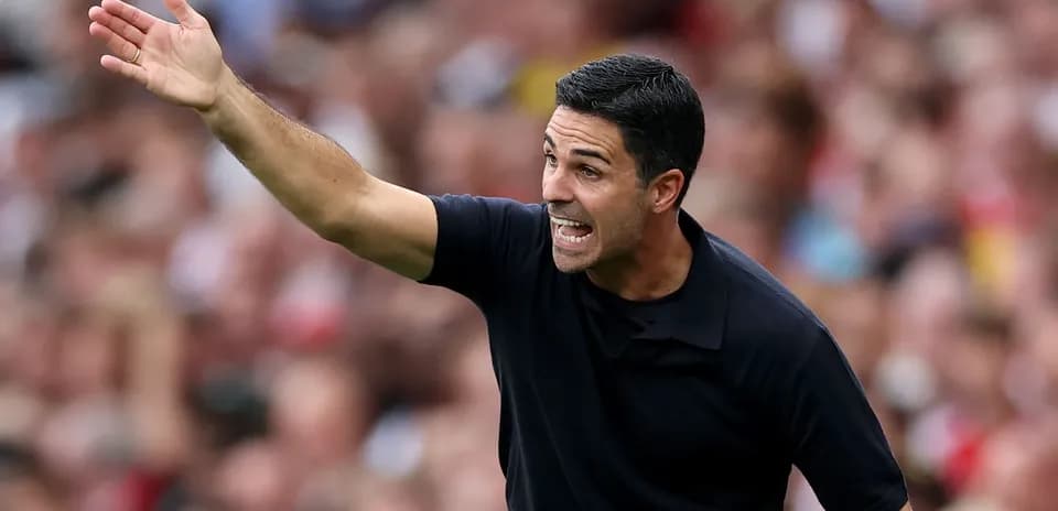 Coach gesturing during a football match on the sidelines Coach gesturing during a football match on the sidelines