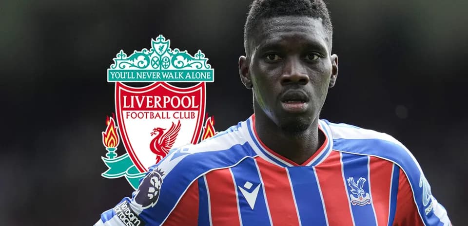 Crystal Palace player with Liverpool logo in background Crystal Palace player with Liverpool logo in background